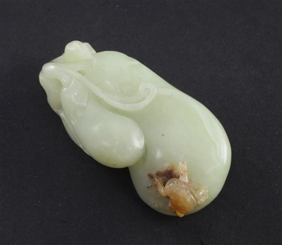 A Chinese yellow and russet jade carving of gourds, 19th-20th century, 5.5cm